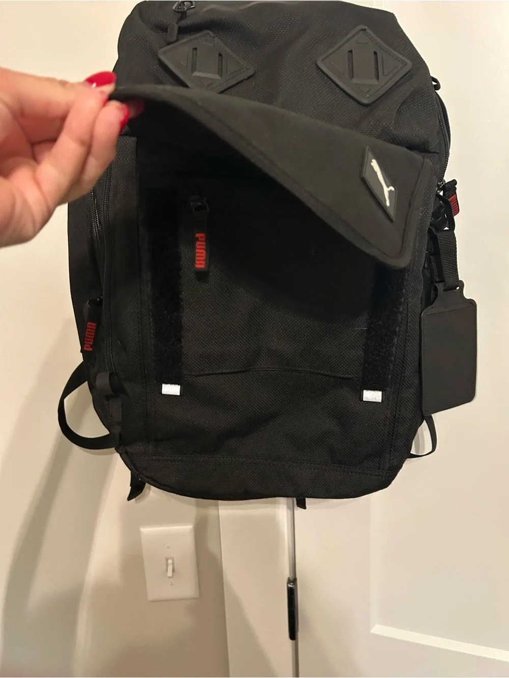 Puma Black Backpack with Red Accent Zippers